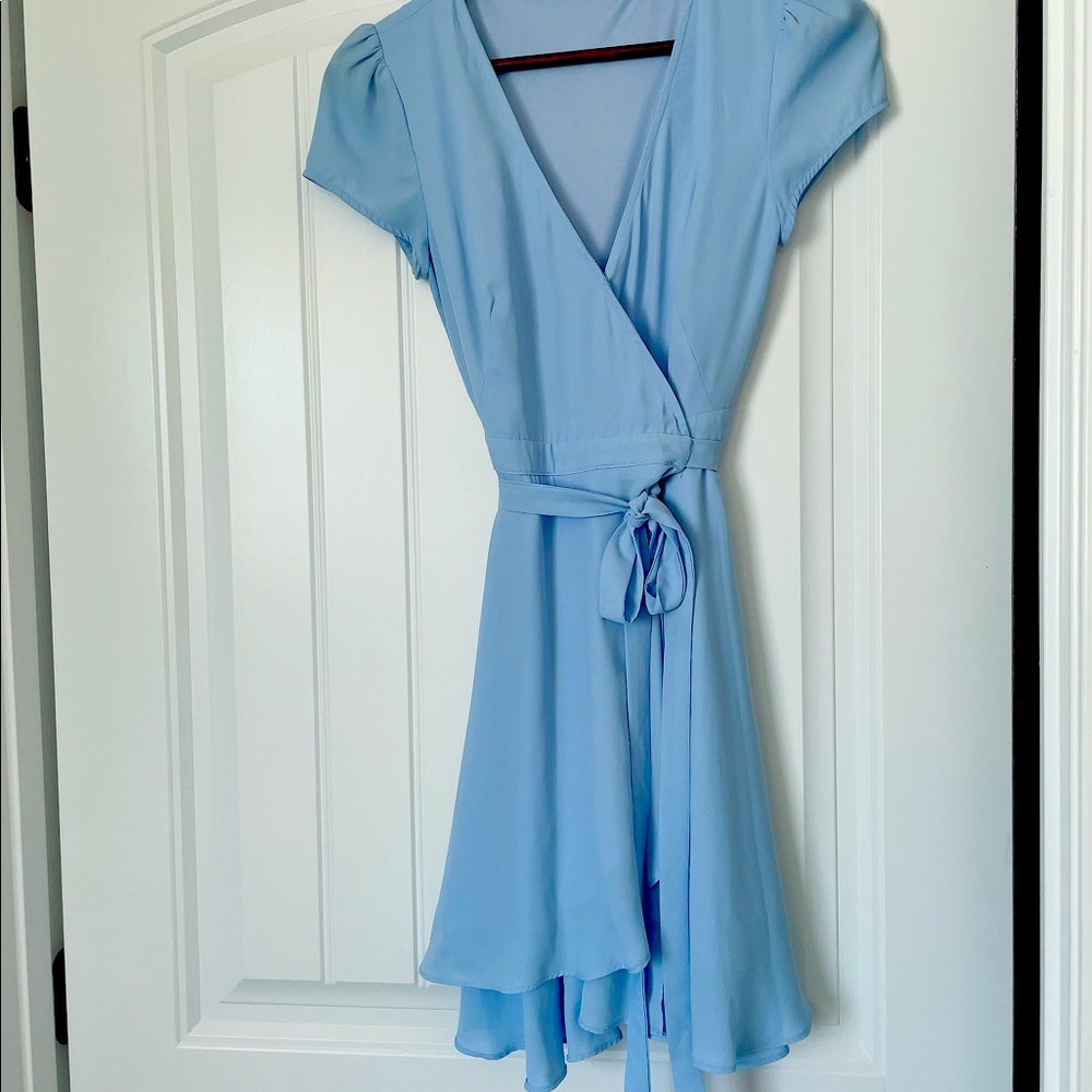 Adorable Boutique Wrap dress. Fit and flare mini dress size Small. Wrap tie